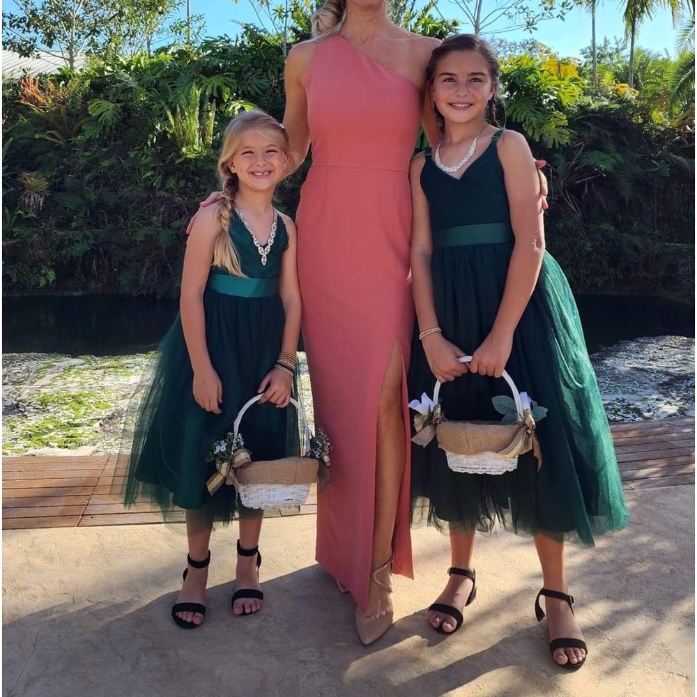 Two beautiful green dresses. Size 4 & 8 worn once!